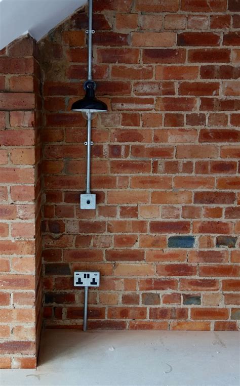 brick wall electrical box|exposed conduit on brick wall.